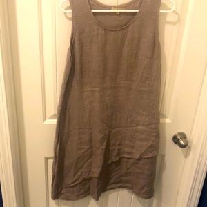 Linen khaki dress. It is a small. Smoke free environment.